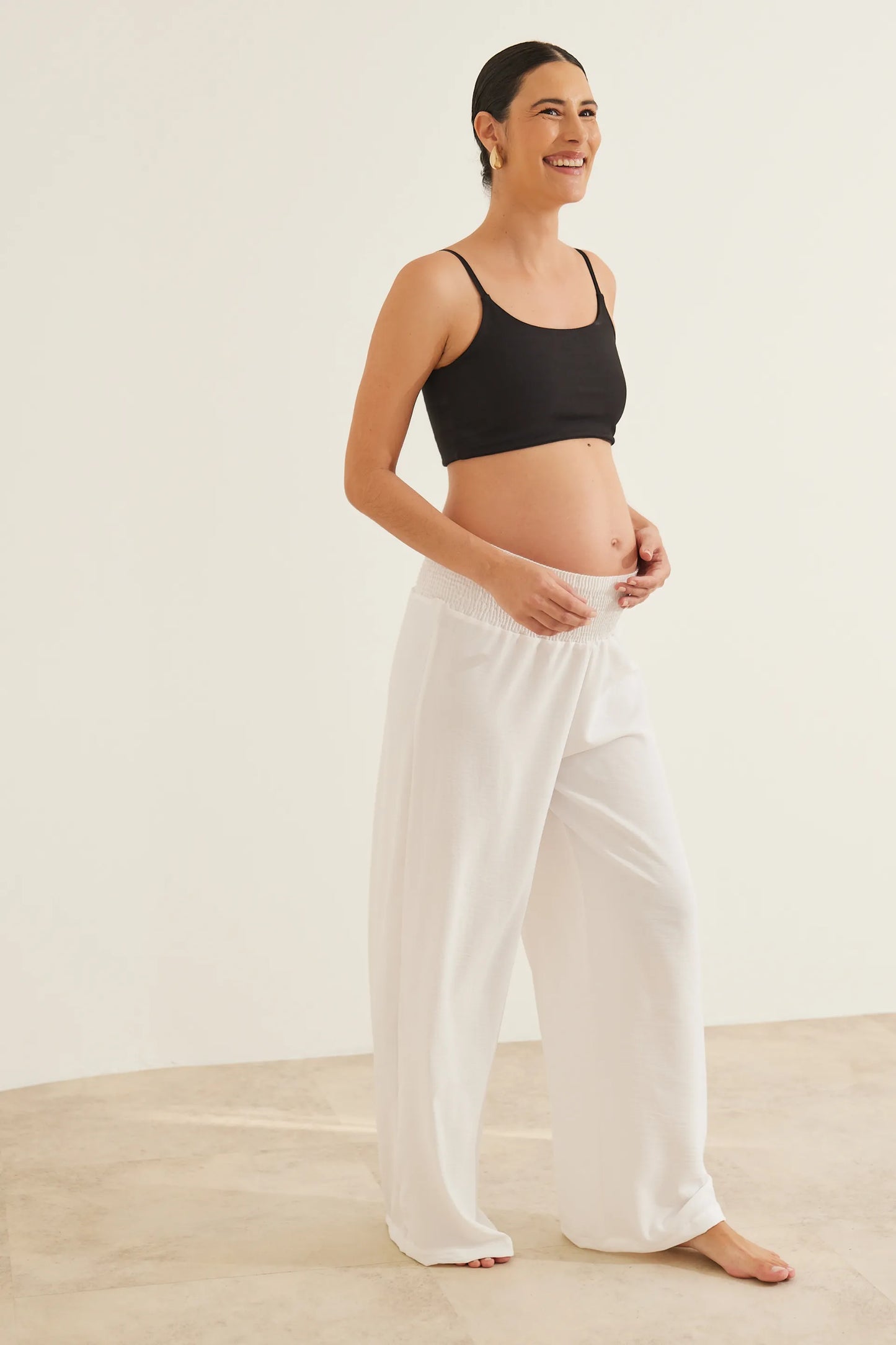 CALÇA GESTANTE E PÓS-PARTO SOLTINHA COM LASTEX