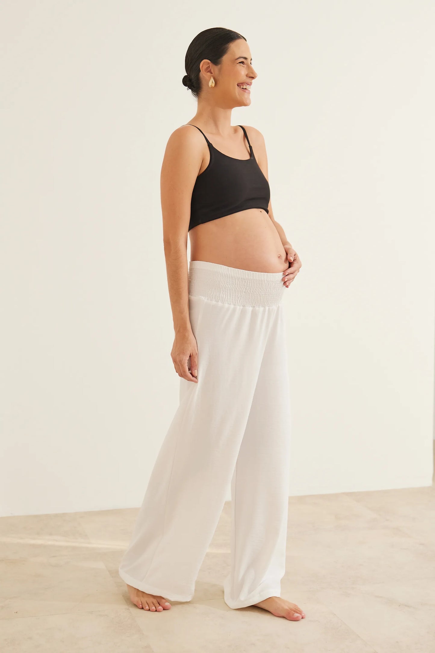 CALÇA GESTANTE E PÓS-PARTO SOLTINHA COM LASTEX